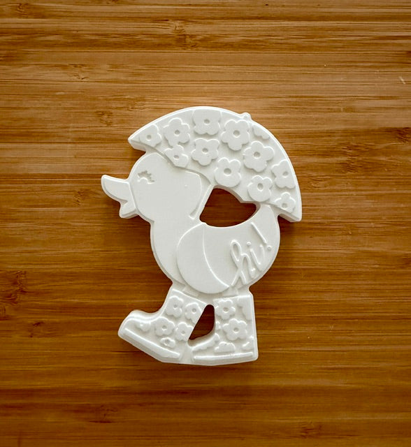 Floral bird ceramic bisque figurine unpainted on wood background
