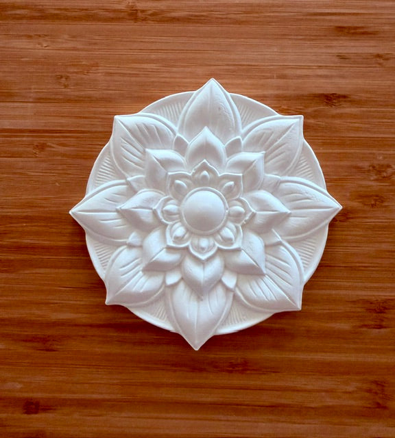 Mandala flower plate ceramic bisque unpainted on wood background