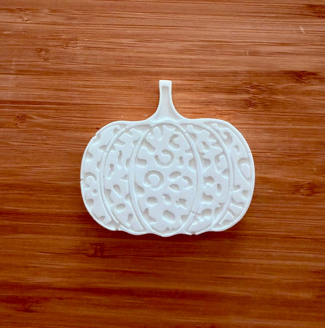 Leopard print pumpkin ceramic bisque unpainted on wood background