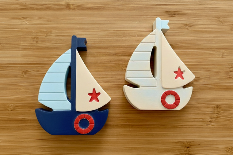 Classic nautical sailboats on wood