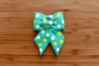 Polka Dot Bow on Clean Wood